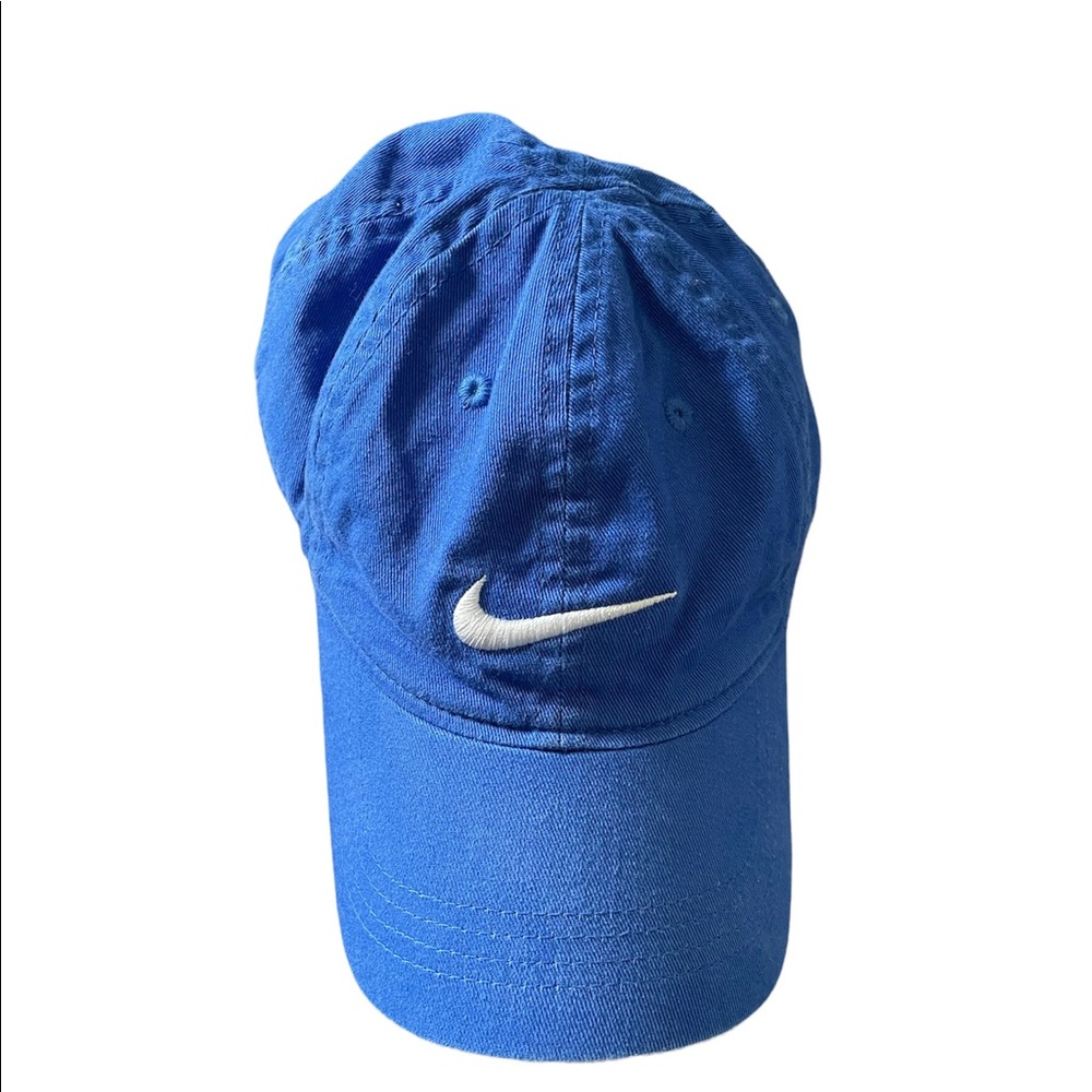 Nike blue youth cap with Velcro adjustable back and embroidered white Nike check
